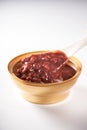 Bowl of sweet and fresh red bean paste on white background, Cantonese style dessert