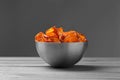 Bowl of sweet potato chips on table Royalty Free Stock Photo