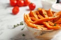 Bowl with sweet potato fries on table Royalty Free Stock Photo