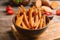 Bowl with sweet potato fries on table Royalty Free Stock Photo