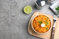 Bowl of sweet potato puree served on grey table. Space for text Royalty Free Stock Photo