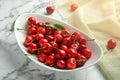 Bowl with sweet red cherries on table Royalty Free Stock Photo