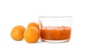 Bowl with tasty apricot jam and fruits Royalty Free Stock Photo