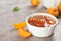 Bowl with tasty apricot jam Royalty Free Stock Photo