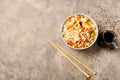 Bowl with tasty boiled rice and vegetables on table Royalty Free Stock Photo