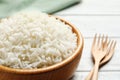 Bowl of tasty cooked rice served on table. Space for text Royalty Free Stock Photo