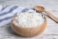 Bowl with tasty cooked rice on white table, closeup Royalty Free Stock Photo