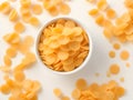 bowl with tasty cornflakes on light background, closeup. space for text