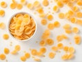 bowl with tasty cornflakes on light background, closeup. space for text