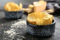 Bowl with tasty crispy potato chips on grey table Royalty Free Stock Photo