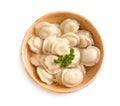 Bowl of tasty dumplings in broth  on white, top view Royalty Free Stock Photo