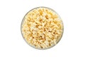 Bowl with tasty popcorn isolated on background Royalty Free Stock Photo