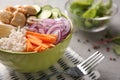 Bowl with tasty rice, vegetables and meat on table, closeup Royalty Free Stock Photo