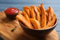 Bowl with tasty sweet potato fries Royalty Free Stock Photo