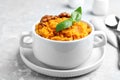 Bowl of tasty sweet potato puree on marble table Royalty Free Stock Photo