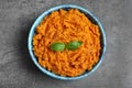 Bowl of tasty sweet potato puree on grey table Royalty Free Stock Photo