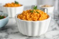 Bowl of tasty sweet potato puree on marble Royalty Free Stock Photo