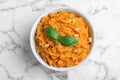 Bowl of tasty sweet potato puree on marble table Royalty Free Stock Photo