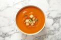 Bowl of tasty sweet potato soup on marble table Royalty Free Stock Photo