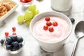 Bowl with tasty yogurt and berries