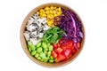 Bowl of tofu and quinoa, bulgur, corn, red cabbage, bell pepper, edamame beans, arugula, black sesame on a white background 1 Royalty Free Stock Photo