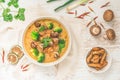 Bowl with Tom Kha Gai soup with various vegetables Royalty Free Stock Photo