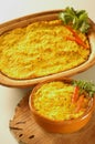 Bowl of traditional Chilean Pastel de Choclo (corn pie) the corn-basil Royalty Free Stock Photo