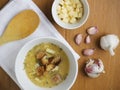 Bowl of a traditional Czech and Slovak garlic soup called cesnecka