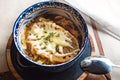 Bowl of traditional french onion soup close-up Royalty Free Stock Photo