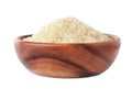 Bowl with uncooked parboiled rice on white