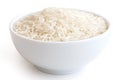 Bowl of uncooked white long grain rice on white Royalty Free Stock Photo