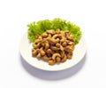 Bowl of unshelled cashew nuts