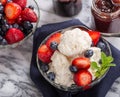 Bowl of Vanilla Ice Cream With Blueberries and Strawberries Royalty Free Stock Photo