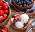 Bowl of Vanilla Ice Cream With Blueberries and Strawberries Royalty Free Stock Photo