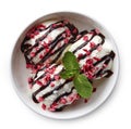 Bowl of vanilla ice cream, chocolate sauce and strawberry pieces Royalty Free Stock Photo