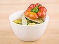 Bowl of vegetarian soup on wooden background