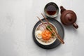 Bowl of veggie noodle broth ramen with egg, carrot, radish and sesam Royalty Free Stock Photo