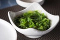A bowl of Wakame seaweed salad close up