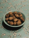 Bowl of walnuts on a oil cloth