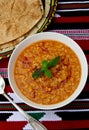 Bowl of warming red lentil and burgul soup Royalty Free Stock Photo