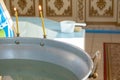 A bowl of water for baptism in the Orthodox Church Royalty Free Stock Photo