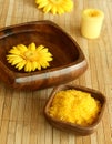 bowl with water and gerber, bath salt, candle. Royalty Free Stock Photo