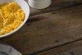 Bowl of wheaties cereal breakfast on wooden table Royalty Free Stock Photo