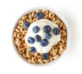 Bowl of Whole Grain Cheerios Cereal with blueberries yogurt, fro Royalty Free Stock Photo