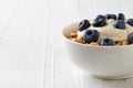 Bowl of Whole Grain Cheerios Cereal with blueberries and yogurt