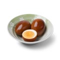 Bowl with whole and half soy sauce eggs, Shoyu tamago Royalty Free Stock Photo