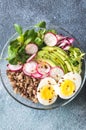 Bowl of wild rice with avocado, egg and lettuce Royalty Free Stock Photo