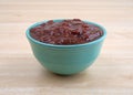 Bowl of wild strawberry preserves on a table