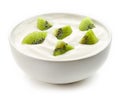 Bowl of yogurt with kiwi pieces