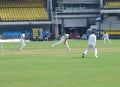 Bowler Balling in a Test Cricket Match. Royalty Free Stock Photo